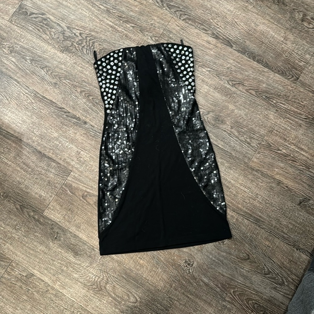 What seal mini dress with silver accent perfect for New Year’s Eve